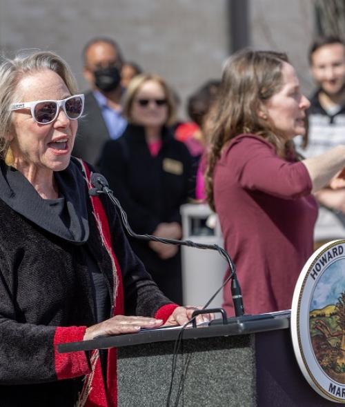 Deb Jung speaking at the Newly Renovated East Columbia 50+ Center Grand Opening