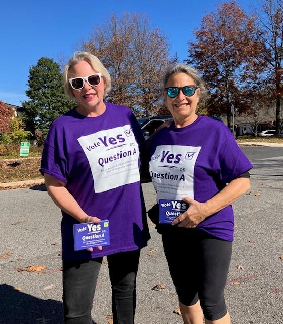 Deb Jung and supporter campaigning for Question A Charter Amendment 